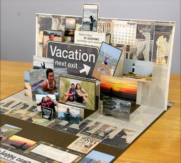 a table topped with lots of pictures and magnets next to a sign that says vacation