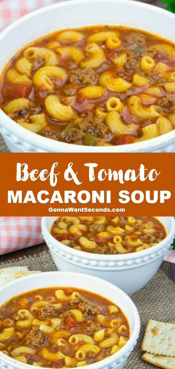 beef and tomato macaroni soup in two bowls with crackers on the side