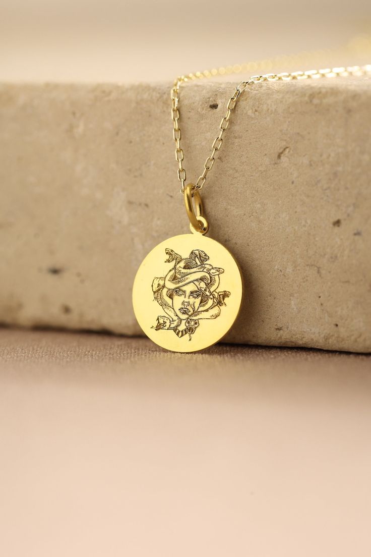 Gold Medusa Pendant - Medusa Gold Necklace ● Material of pendant: Solid Gold 14k ( REAL GOLD ) ● Metal Stamp: 14k ( REAL GOLD ) ● The pendant is available in 5 sizes: - 12,7 mm / 0.5 inches (Diameter) - 14,0 mm / 0,55 inches ( Diameter ) In the photos - 15,3 mm / 0.6 inches ( Diameter ) - 16,5 mm / 0,65 inches ( Diameter ) - 19,1 mm / 0,75 inches ( Diameter ) ( In the photos the size is 14mm / 0.55 inches Diameter ) ( Jump Ring inner diameter: 4 mm ) ● Material of chain: Solid gold 14k ( REAL GO Medusa Mythology, Medusa Necklace, Medusa Pendant, Necklace Personalized, Metal Stamping, Gold Style, Real Gold, Gold Pendant, 6 Inches