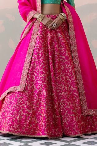 Pink lehenga in pure raw silk base with vine gardenia jaal embroidery all over, hand embroidered border on the edges and hand made tassels. Paired with a pure raw silk hand woven Banarasi bloom buti elbow sleeves padded blouse and silk organza dupatta with hand embroidered border. - Aza Fashions Raw Silk Anarkali Set With Pallu For Reception, Intricate Embroidery Raw Silk Lehenga, Tissue Silk Lehenga With Embroidery For Diwali, Silk Thread Lehenga For Diwali, Festive Silk Thread Lehenga, Diwali Lehenga With Resham Embroidery In Raw Silk, Diwali Resham Embroidery Lehenga In Raw Silk, Transitional Pink Tissue Silk Lehenga, Silk Lehenga For Wedding And Transitional Seasons