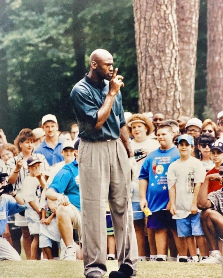 a man standing in front of a group of people