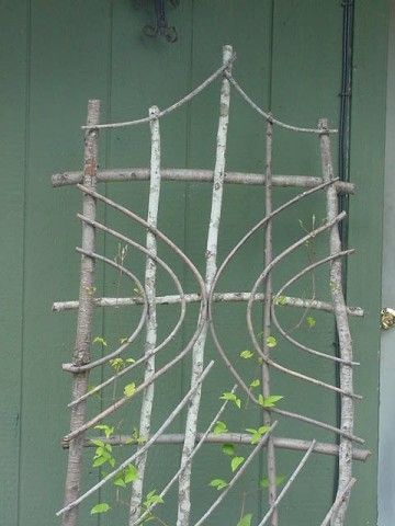 a planter made out of branches and vines