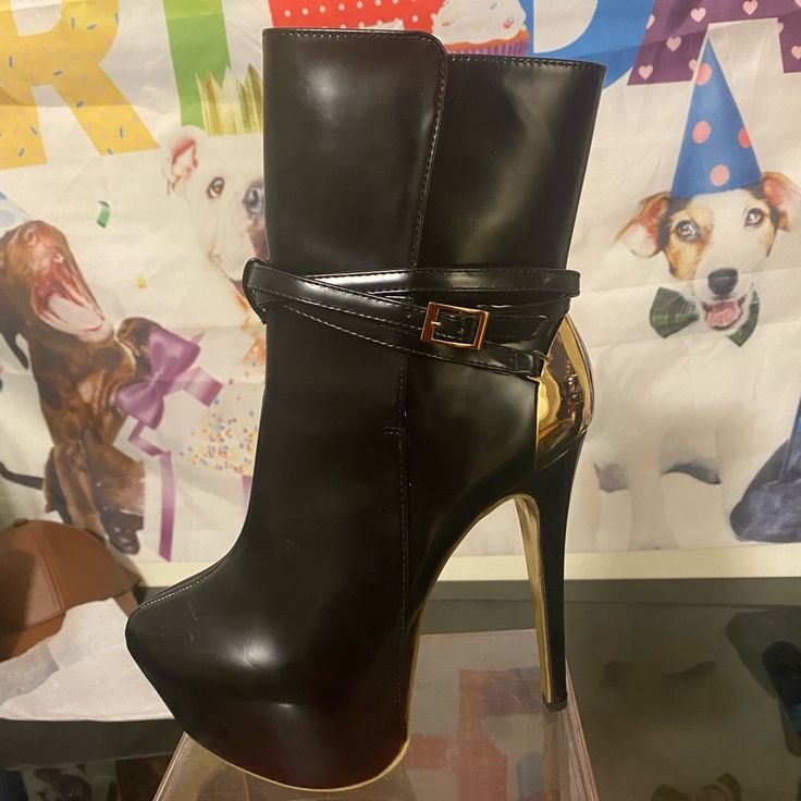 Black Leather High Heeled Boots With Gold Soles. Never Worn. Perfect Condition. Pull On No Zipper. Stunning Boots. Size 8 Black Platform Mid-calf Boots For Party, Open Toe Boots With Wrapped Heel For Night Out, Black Ankle Boots With Buckle Closure, Faux Leather Boots With Buckle For Night Out, Night Out Faux Leather Heeled Boots With Buckle Closure, Party Boots With Wrapped Heel And Closed Toe, Evening Faux Leather Boots With Buckle Closure, Faux Leather Ankle Strap Party Boots, Party Ankle-high Platform Boots With Buckle Closure