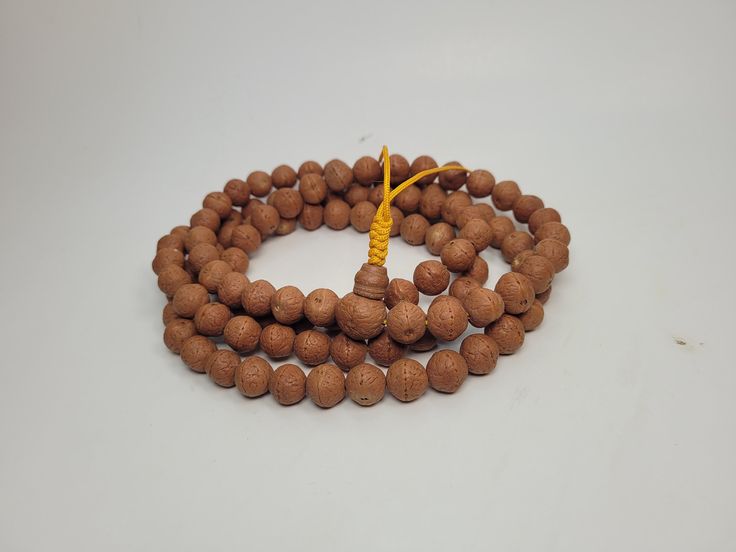 Natural Bodhichitta mala also known as Bodhi seed. 100% Natural A++ super fine quality prayer bead mala. Approx 10 mm size with 108 beads . Grown in the Himalayan kingdom of Nepal. Hand Wrapped Mala For Meditation, Hand Wrapped Mala With Round Beads For Meditation, Hand Wrapped Round Beads Mala For Meditation, Traditional 8mm Beads Mala For Healing, Traditional Gemstone Beads Rosary For Meditation, Traditional Hand Knotted Mala For Meditation, Traditional Rosary With 8mm Beads For Meditation, Brown Round Beads Mala For Puja, Brown Mala With 8mm Beads For Puja