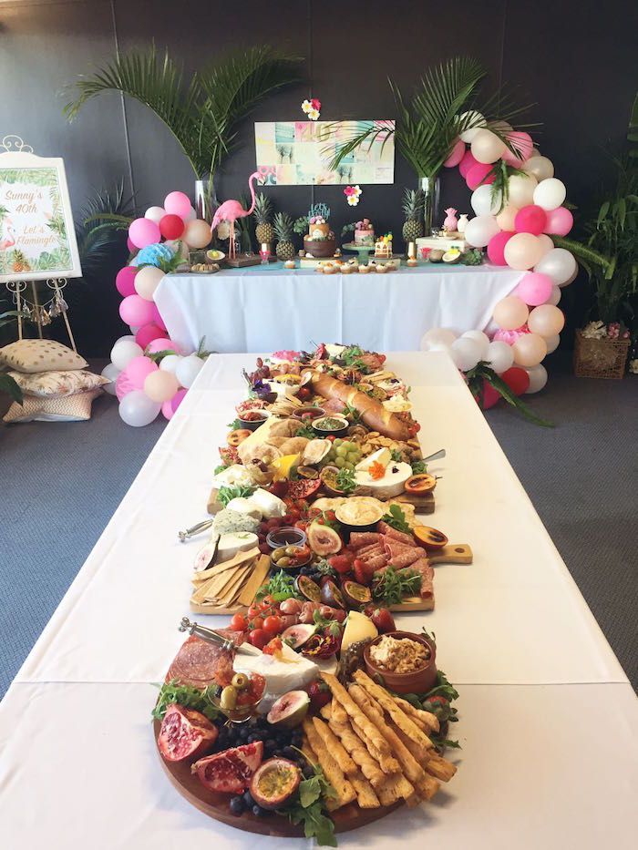 a long table covered in lots of food