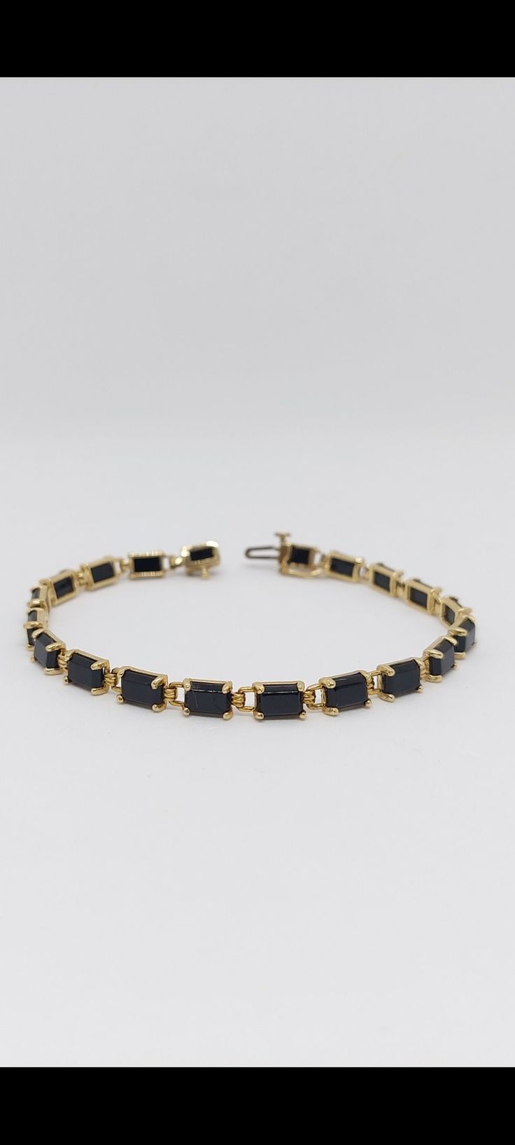 ONYX Link 14k Yellow Gold Bracelet. Link section Onyx Bracelet in 14K. Best gift for her and for him. Onyx Lover. Bracelet Info: - Gemstone: Black Onyx. - Onyx Bracelet length: 7.5 Inches / Bracelet width: 4 Millimeters - Materials: Onyx / Yellow Gold - Stone Color: Black. - Finished: 14k - Nice gift box Included. Elegant Black Bracelets In 14k Gold, Elegant Black 14k Gold Bracelets, Formal Black 14k Gold Bracelets, Formal Black Gold Bracelet, Black 14k Gold Bracelet For Formal Occasions, Black 14k Gold Bracelet As Gift, Formal Black Fine Jewelry Bracelets, Black Jubilee Bracelet For Anniversary, Black 14k Gold Bracelets As Gift