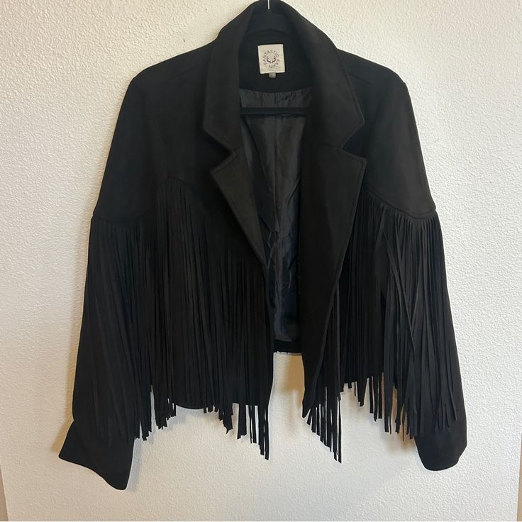 Nwot Black Suede Fringe Cropped Jacket. Size Large. Silky Lining, Soft To The Touch. No Snags, Stains Or Pilling. Smoke & Pet Free Home. Winter Fringe Outerwear For Night Out, Chic Fringe Blazer For Fall, Chic Fringed Outerwear For Night Out, Chic Fringe Outerwear For Work, Spring Fringed Outerwear For Work, Black Fringe Outerwear For Fall, Edgy Winter Outerwear With Fringe, Edgy Fringe Winter Outerwear, Chic Black Outerwear With Fringe