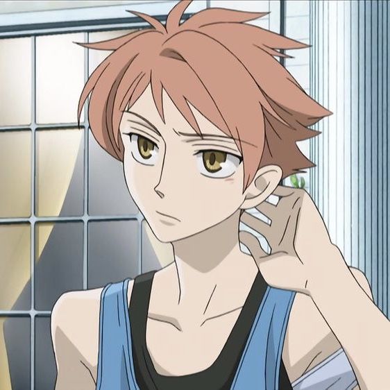 an anime character talking on a cell phone with his hand up to his ear and wearing a blue tank top