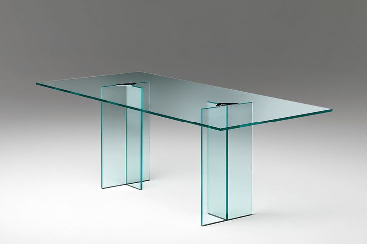 a glass table with two legs in the shape of a rectangle, on a grey background