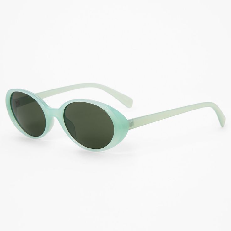 Mint green is so trendy, and perfect for these stylish shades! Protect those pretty eyes with these lightweight sunglasses, so slim and so sleek. Lens Color: Smoke Frame Color: Mint Frame Type: Round Dimensions: 6" W x 1.5" H Material: Plastic - Claire's Mint Green Round Sunglasses Mint Green Jewelry, Green Sunglasses, Fashionable Jewelry, Global Brands, Pretty Eyes, Jewelry And Accessories, Mint Green, Round Sunglasses, Fashion Jewelry