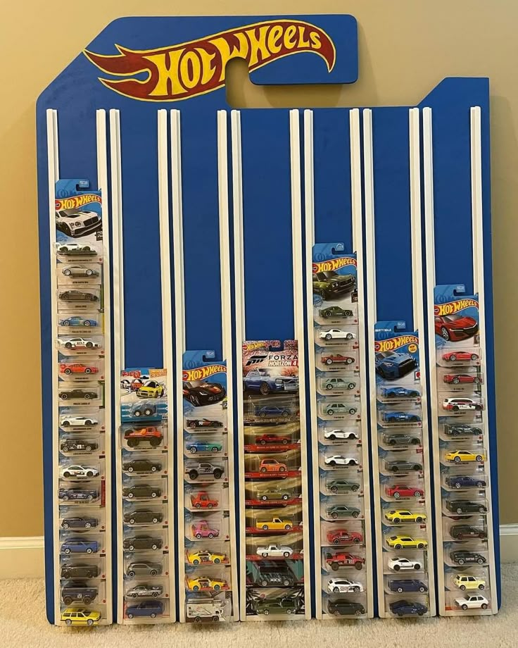 the hot wheels display case is full of cars