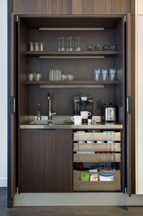 an open cabinet with many items in it