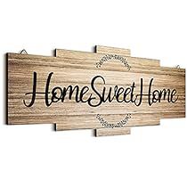 a wooden sign with the words home sweet home on it's front and back