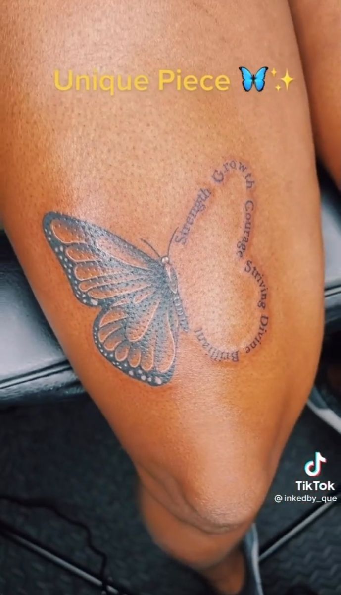 a woman's leg with a butterfly tattoo on it and the words unique piece