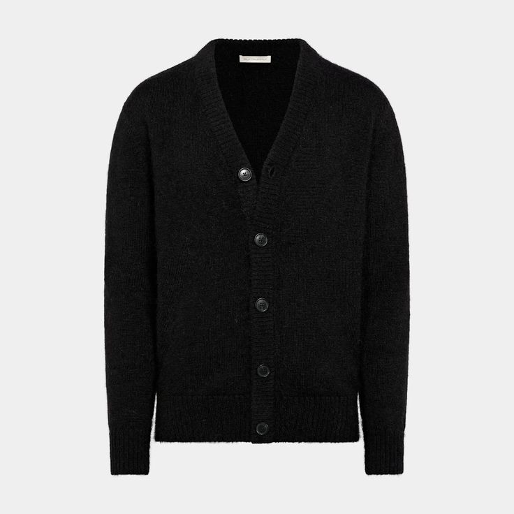 This black cardigan is tailored to a slim fit and features a 5-button closure, long sleeves, and a cozy, soft texture. Classic Black V-neck Sweater, Classic Black V-neck Sweater For Fall, Black Cashmere V-neck Sweater For Winter, Classic Black Merino Wool Sweater, Fitted Black Cashmere Outerwear, Black Cashmere Sweater For Formal Occasions, Formal Wool Button-up Cardigan, Classic Black Cashmere Cardigan, Formal Winter Cashmere Cardigan