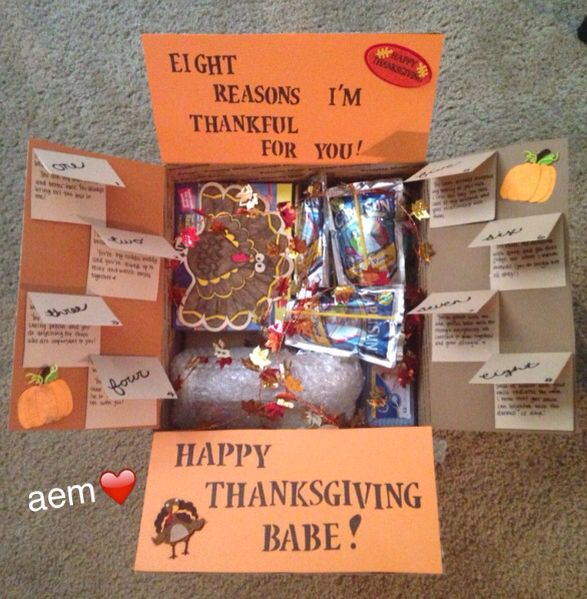 an open box filled with lots of thanksgiving treats