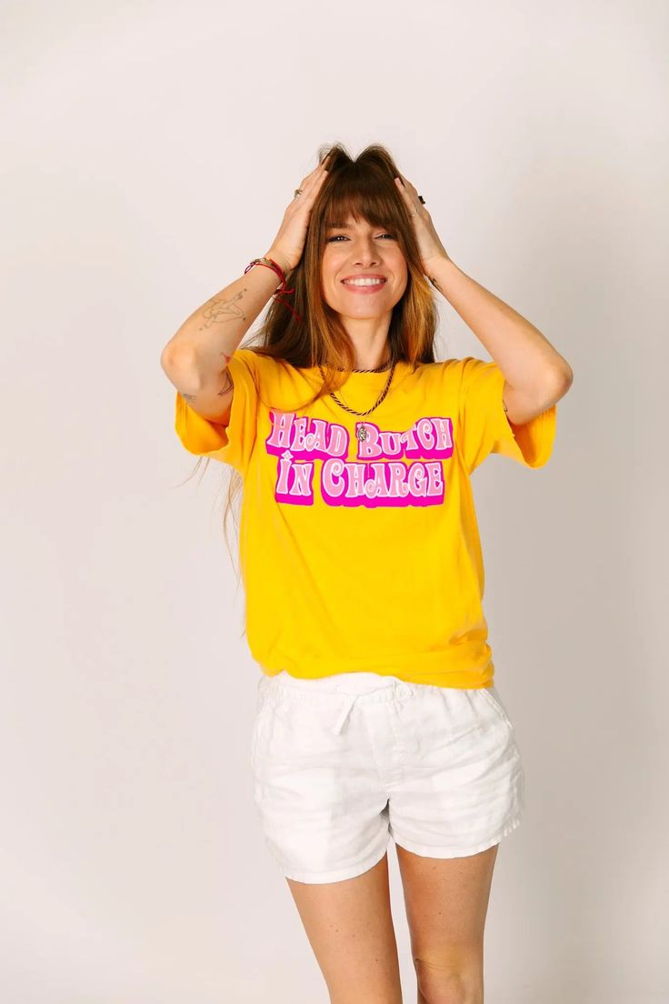 "Head Butch In Charge" screen-printed yellow shirt. Let everyone know who is really in charge with this fun shirt. Pre-shrunk, soft washed, garment dyed fabric Designed and made in New Orleans Unisex sizing Size Chart: (in inches) S M L XL 2XL 3XL Sleeve Length 8 8 ¼ 9 9 ½ 9 ¾ 9 ¾ Full Body Length 27 28 ½ 30 31 ½ 32 ¾ 33 Body Width 18 ½ 20 ½ 22 ½ 24 ½ 26 ½ 28 Yellow Cotton Shirt With Screen Print, Yellow Top With Funny Print For Streetwear, Yellow Cotton T-shirt With Screen Print, Yellow Shirt With Funny Print And Relaxed Fit, Yellow Shirt With Funny Print In Relaxed Fit, Trendy Yellow T-shirt With Screen Print, Fun Yellow Tops With Text Print, Yellow Graphic Tee Shirt With Screen Print, Yellow Graphic Tee Shirt With Text Print