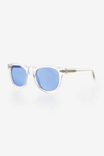 Cool, sleek, and timeless — that’s the look we were going for when we designed the BENSON line. Translucent clear acetate and metal rivets make for enduring style that flatters more every face. u00a0 Polycarbonate Lenses Triple-Barrel Hinges RX Optical Quality SIZE 49mm Eye Size 23mm Bridge 145mm Temple/Arm 5 3/8” Width 1 3/4” Height | Sunglass Museum Benson Tinted Lens Sunglasses in Clear/Blue at Urban Outfitters Classic Clear Sunglasses For Formal Occasions, Classic Clear Sunglasses For Summer, Modern Clear Sunglasses For Formal Occasions, Modern Clear Sunglasses For Formal Events, Formal Clear Glass Sunglasses, Classic Clear Sunglasses With Anti-reflective Coating, Classic Glass Sunglasses For Everyday, Classic Everyday Glass Sunglasses, Modern Clear Sunglasses With Mirrored Lenses