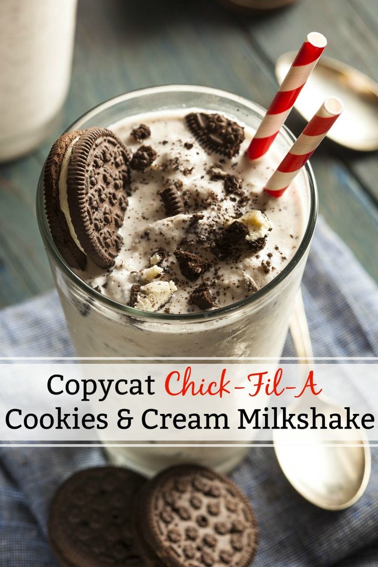 a glass with cookies and cream milk in it