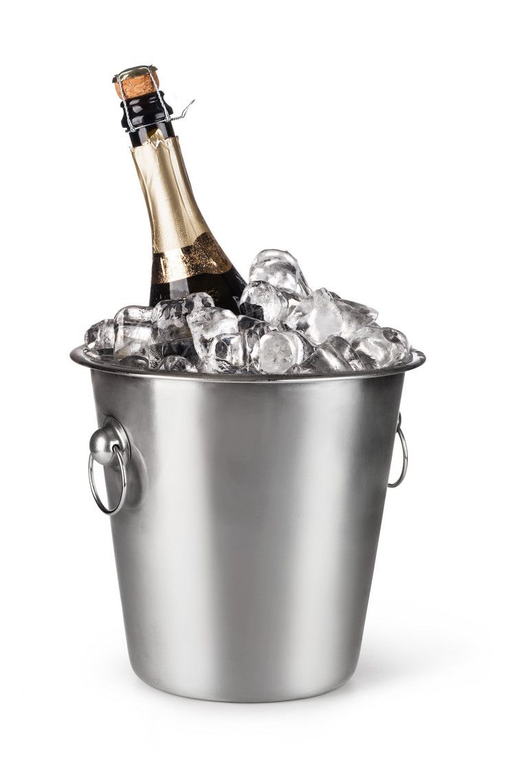 a bottle of champagne is in an ice bucket full of ice cubes on a white background