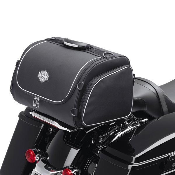 the back end of a black motorcycle with a saddle bag on it's seat