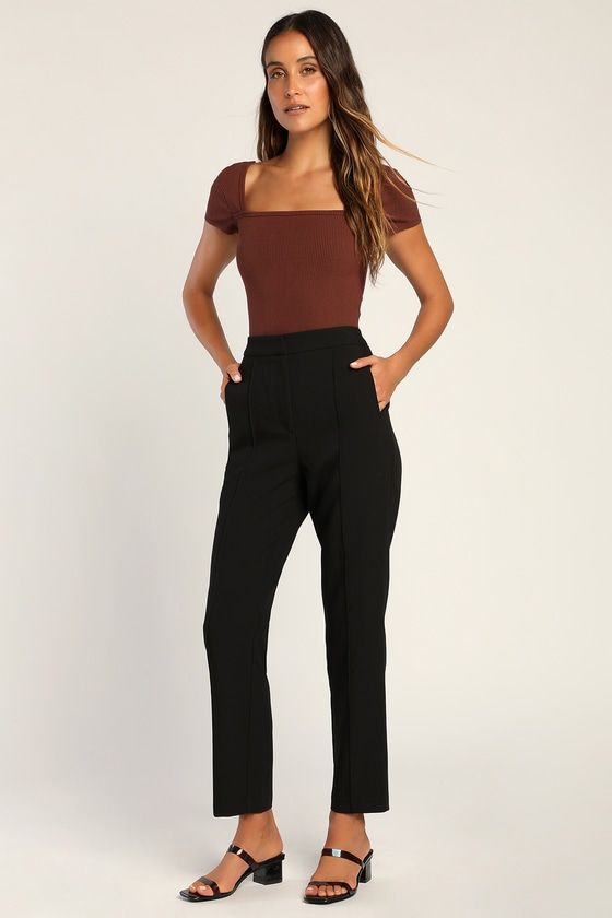 From the desk to after-hours fun, the Lulus Chic Business Black High-Waisted Trouser Pants will have you looking fab! Stretch-woven fabric shapes these chic trousers with a seamed detail that travels down the tapered legs to ankle-length hems. Functional side pockets frame the high waistband that has a hidden fly with clasp closure and top button, while a decorative welt pocket adorns the back. Fit: This garment fits true to size. Length: Ankle length. Size medium Inseam: 28.00 Front Rise: 11.00 High Waisted Trouser Pants, Womens Black Dress Pants, Chic Trousers, You Look Fab, Womens Black Pants, Lulu Fashion, The Desk, Tapered Trousers, Black Trousers