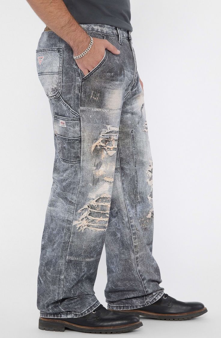 A vintage-inspired take on the utility trend, these distressed nonstretch carpenter jeans feature a low-rise waist, full-length wide legs and a paneled design. 32" inseam; 19" leg opening; 12 1/4" front rise; 16" back rise Front slant pockets; back patch pockets 100% cotton Machine wash, tumble dry Imported Ripped Dark Wash Straight Leg Cargo Jeans, Ripped Straight Leg Dark Wash Cargo Jeans, Dark Wash Ripped Straight Leg Cargo Jeans, Urban Denim Blue Distressed Flare Jeans, Urban Style Distressed Denim Blue Flare Jeans, Urban Distressed Denim Blue Flare Jeans, Distressed Utility Mid-rise Bottoms, Distressed Mid-rise Utility Bottoms, Distressed Mid-rise Denim Blue Cargo Jeans