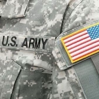 the us army uniform has an american flag on it