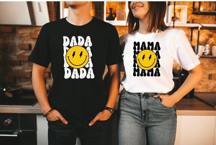 two people standing next to each other wearing t shirts with the words baa baa baa on them