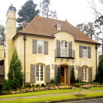 a large white house with lots of windows