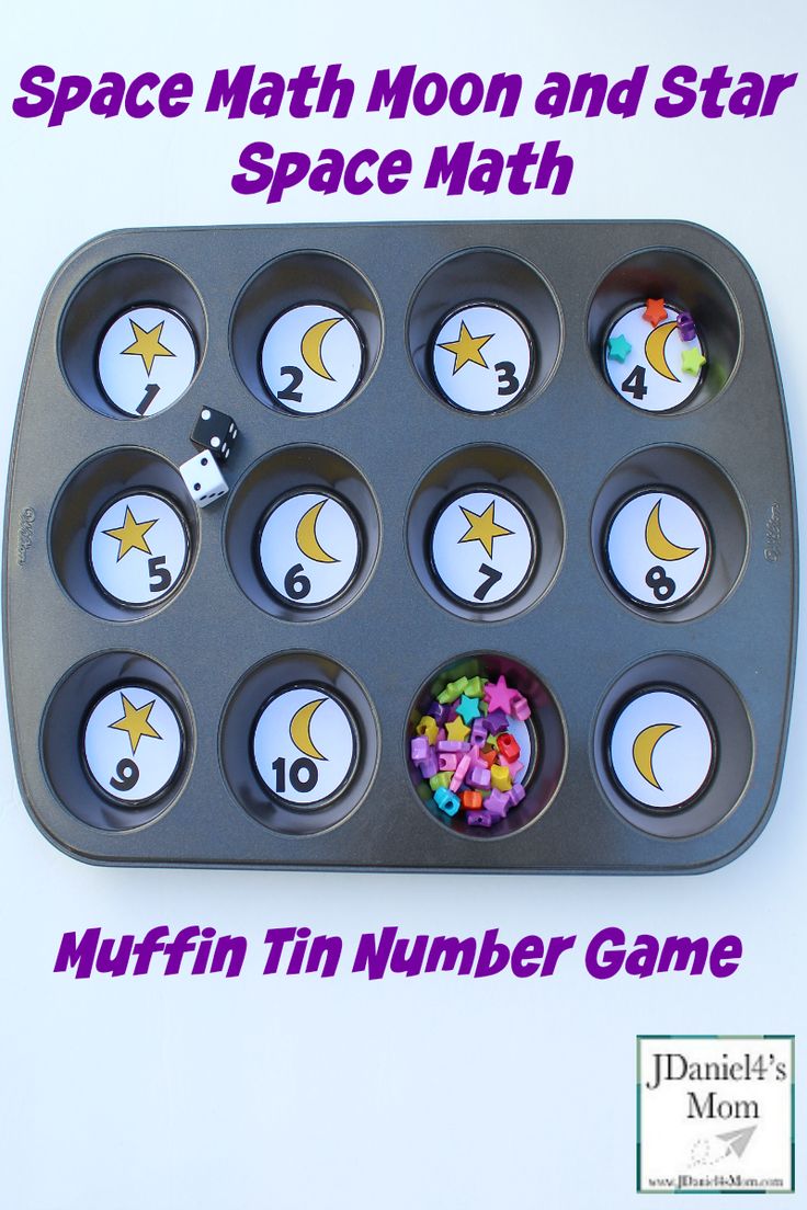 a muffin tin number game with space and stars on it