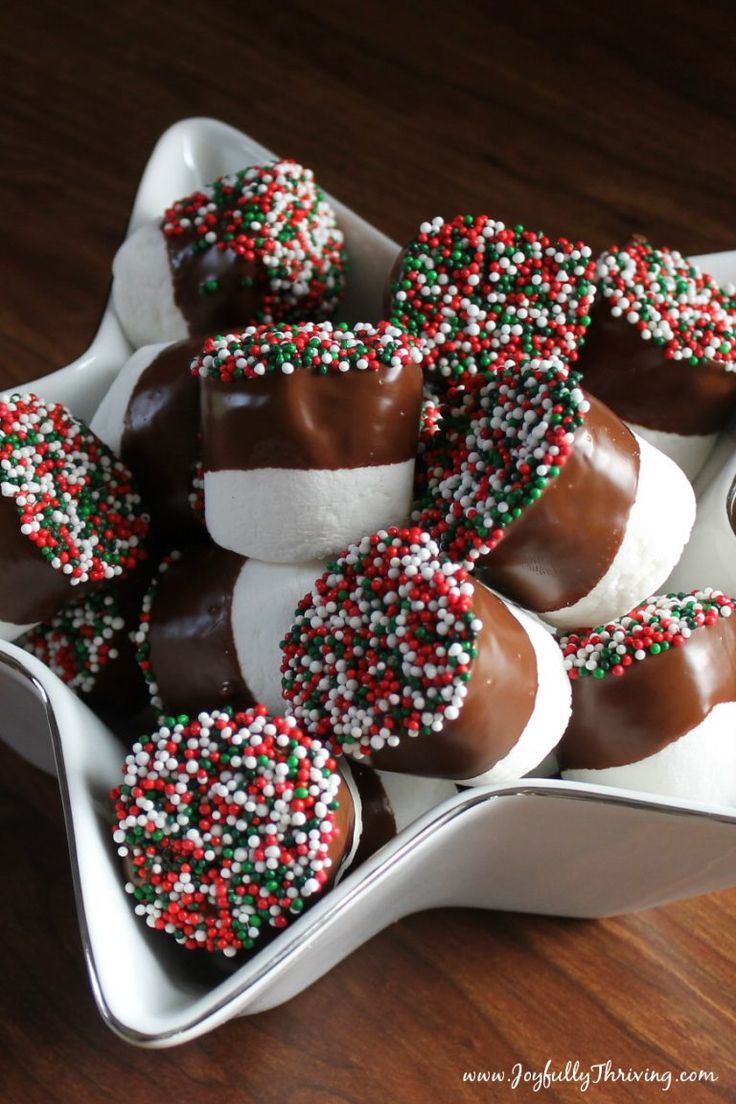 chocolate covered marshmallows in a white dish