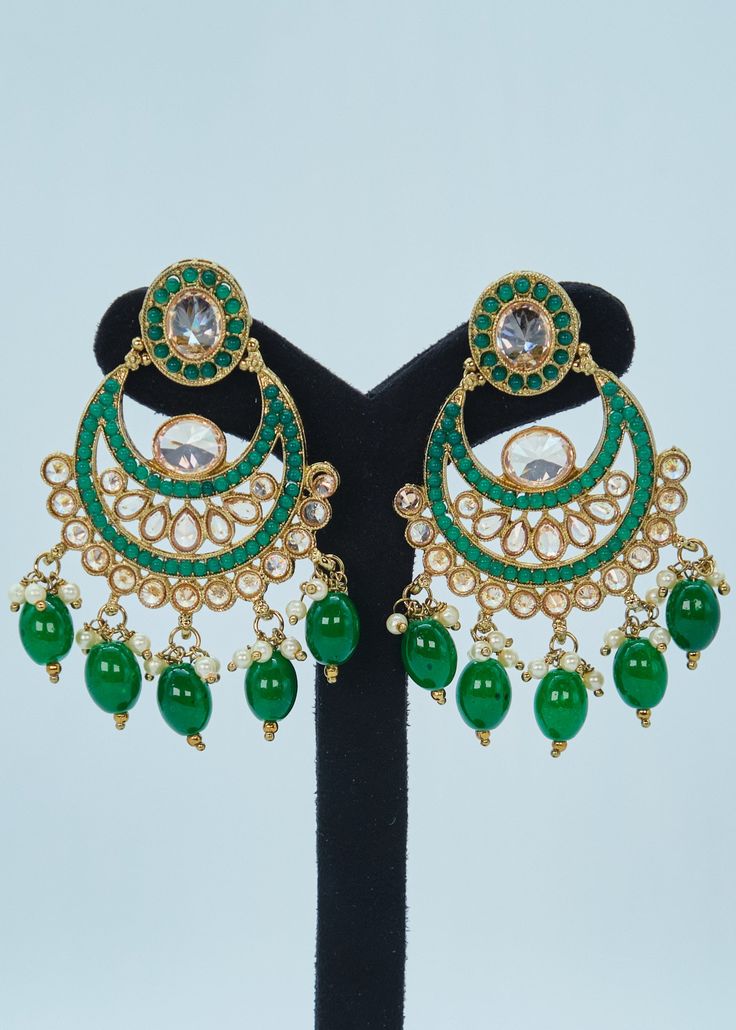 This gorgeous ethnic maang tikka reflects the traditions and aura of our festivals! This is an ideal piece to fit your festive outfits and traditional wear to add a sparkle to your style! Earrings length: Approx. 2.75" Weight of each earring: 19 gms Push-Back Closure. Tikka length: Same as Earrings Antique Gold Plated on high-quality brass as the base metal In-stock & ready-to-ship Color may vary slightly due to light condition & photography. Jewelry Care: Keep away from moisture. Allow perfumes Festive Outfits, Photography Jewelry, Phone Items, Polki Earrings, We Are Festival, Maang Tikka, Earrings Antique, Traditional Wear, Antique Earrings