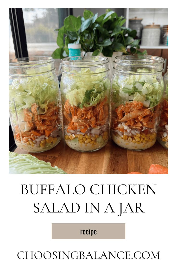 four mason jars filled with salad in a jar