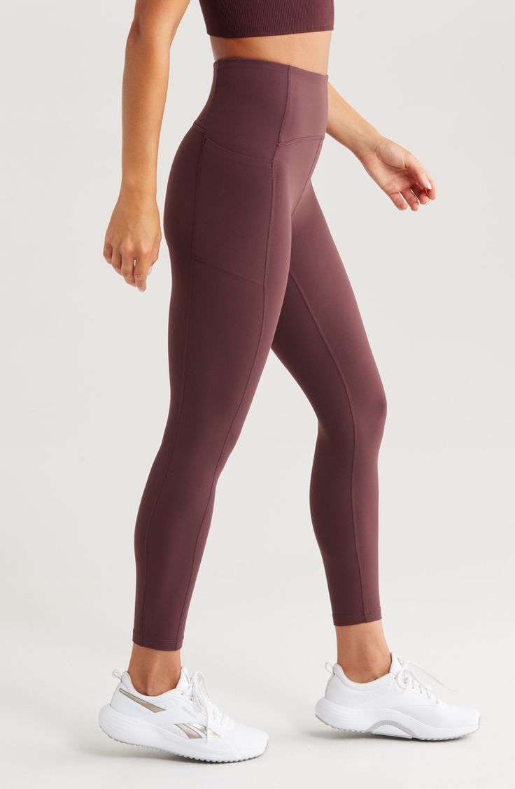 Sculpted flatlock seams define athletic leggings with a supportive mesh layer inside the front waistband and a handy pocket to stash your phone. Made from a stretch-nylon fabric, these high-performance leggings have a silky, buttery feel balanced by lasting durability. 24" inseam; 8 1/2" leg opening; 11" front rise; 13" back rise (size Medium) Pull-on style Drop-in pocket Moisture-wicking fabric engineered for dryness and comfort 74% nylon, 26% spandex Machine wash, tumble dry Imported Athleisure Yoga Tights With Pockets, Yoga Activewear With Hip Pockets, Solid Athleisure Activewear With Functional Pockets, Activewear With Hip Pockets For Workout, Activewear With 4-way Stretch And Hip Pockets For Sports, Solid Activewear With Hip Pockets For Workout, Athleisure Yoga Pants With Hip Pockets, Stretch Activewear With Pockets For Yoga, Solid Color Athleisure Activewear With Pockets