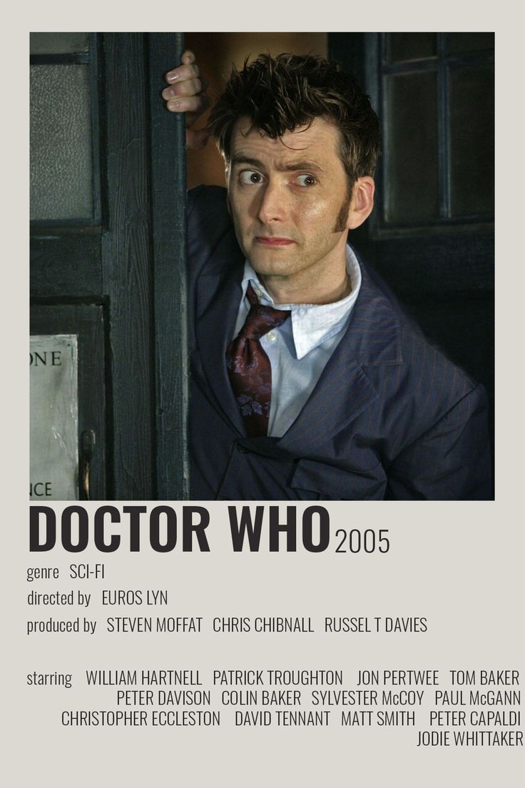 a man in a suit and tie leaning against a door with the words doctor who on it