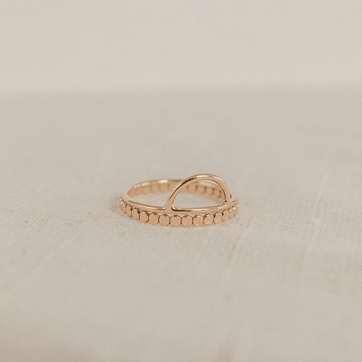 Make each day a sunny side up day with the Sunny Half Circle Stacking Ring. A dainty crescent perfect for layering atop your favourite stacking rings. These rings are handmade just for you and available in Gold Fill or Sterling Silver. As they are handmade, each one is unique. You may notice the tiny join where your ring has been soldered. Dainty Crescent Gold Rings, Dainty Gold Crescent Rings, Everyday Rose Gold Midi Rings In Recycled Gold, 14k Gold-filled Stackable Midi Rings With Open Shape, 14k Gold Filled Stackable Midi Open Rings, Stackable Midi Open Rings In 14k Gold Filled, Adjustable Round Midi Rings In Recycled Gold, Adjustable Recycled Gold Midi Rings, Dainty Adjustable Crescent Ring