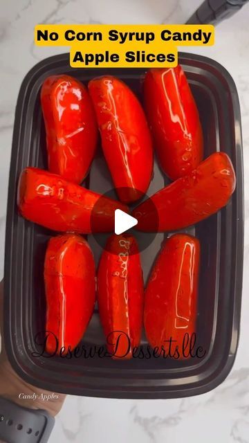 there are several red hot dogs in the container with text overlay that says no corn syrup candy apple slices