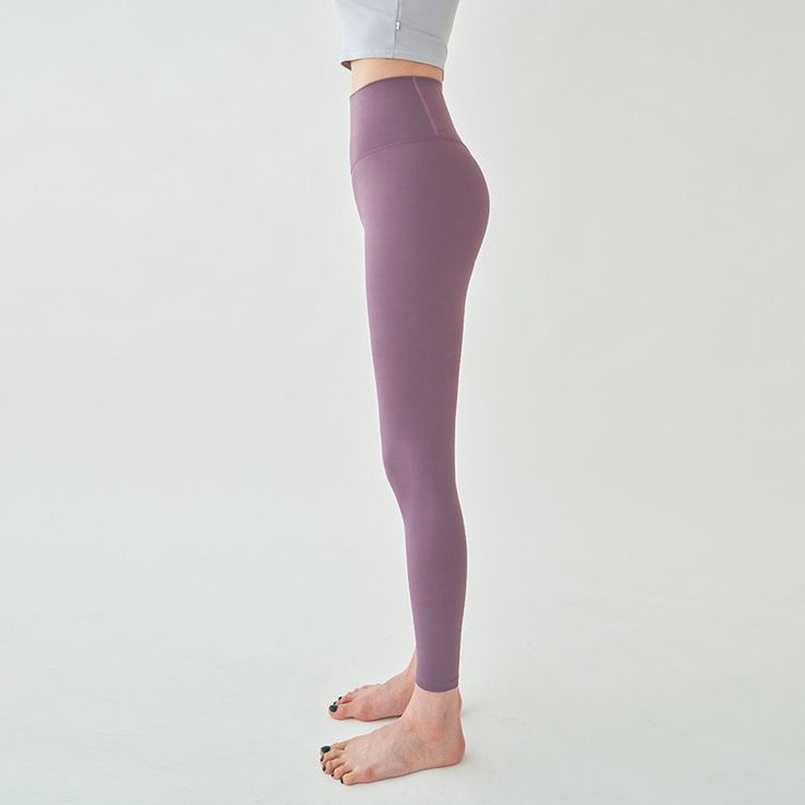 18% spadex/ 82% Polyethylene Model is 5'6" and wearing purple small. High Stretch Purple Leggings For Training, Purple High Stretch Leggings For Training, Purple Compression Yoga Pants For Training, High Stretch Purple Leggings For Gym, Purple High Stretch Leggings For Gym, Purple Training Tights, Purple Compressive Yoga Tights, Purple Fitted Tights For Training, Purple Moisture-wicking Workout Tights