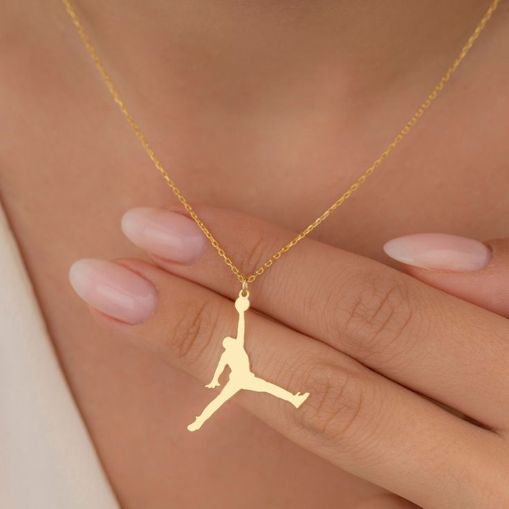 "14K Gold Jordan Necklace (Silver Air Jordan Necklace, Slam Dunk, NBA Jumpman Pendant, Sports Jewelry) is a perfect gifts for her, him, girlfriend, boyfriend, a mom, a sister, or your wife on Christmas, birthday, anniversary. Materials: 925K Sterling Silver Style: Minimalist  Pendant Size : Height 30mm x Width 27mm Chain style: Cable Chain length: from \"12 (+2\" Extender) to \"22 (+2\" Extender) -  (+2\" extender for each product to help if you want to adjust)  Finish: Silver, Gold OTHER INFORM Jordan Necklace, Basketball Jewelry, Preppy Jewelry, Cute Nike Outfits, Minimalist Pendant, Jordan Jewelry, Sports Jewelry, Cute Nike Shoes, Jewelry Accessories Ideas