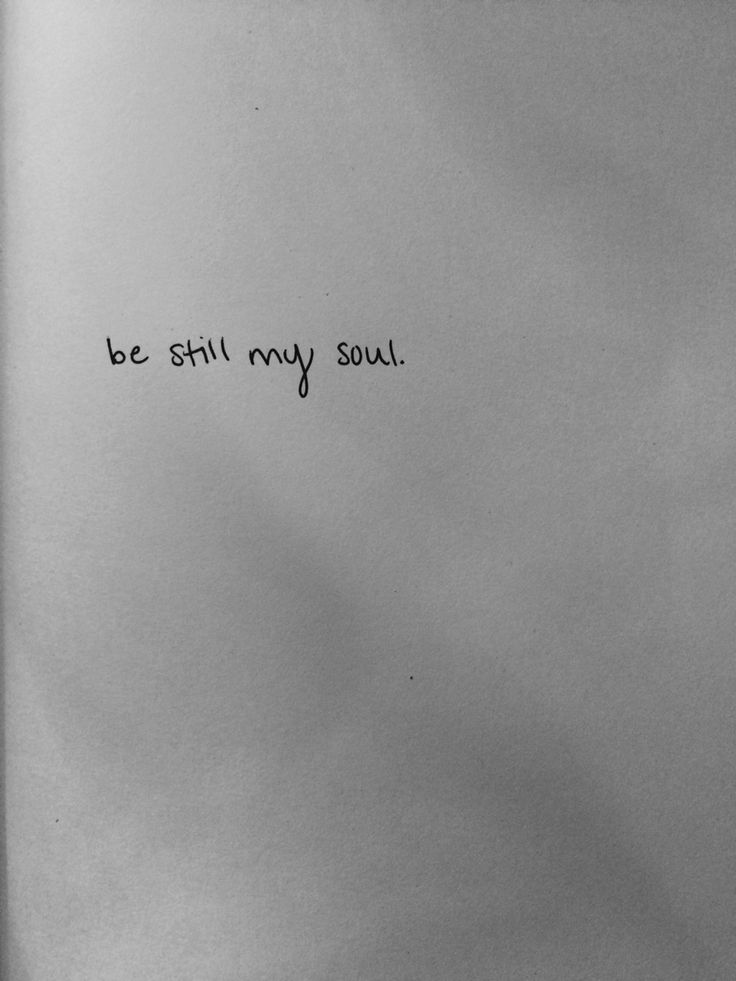 a black and white photo with the words be still my soul written in cursive writing