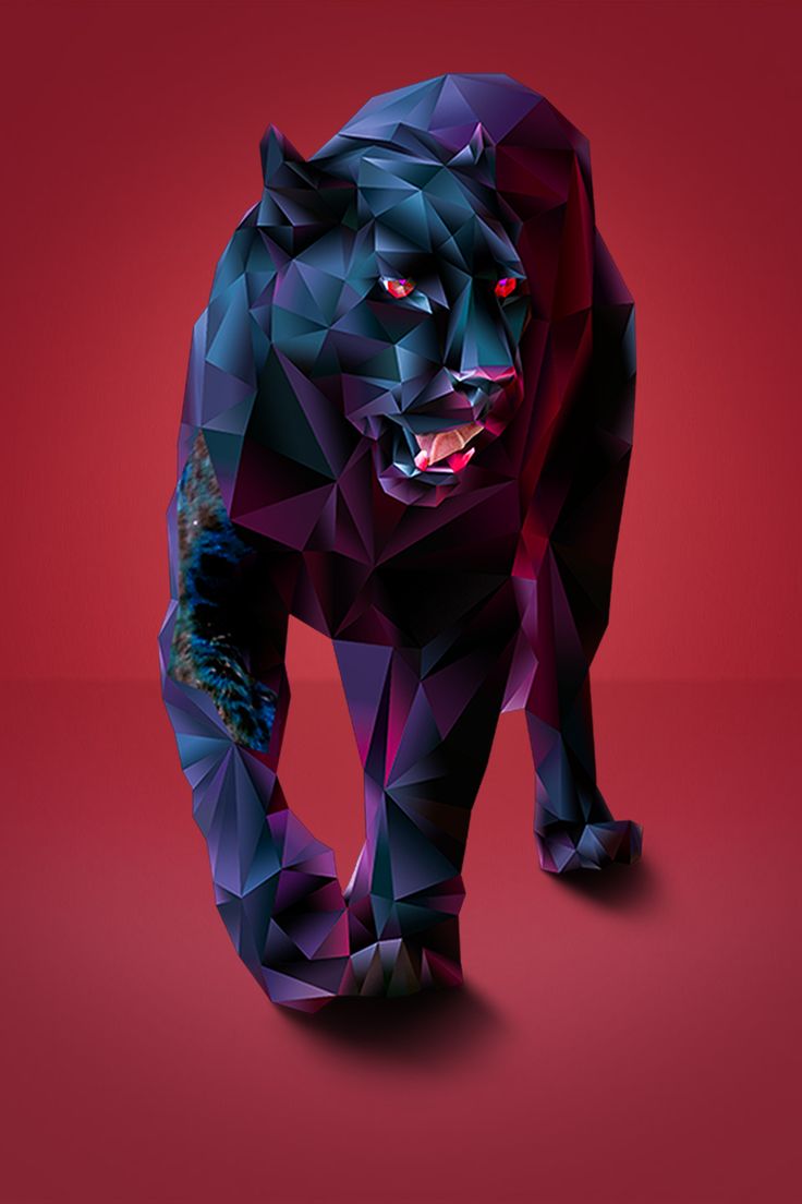 an animal made out of triangles on a red background