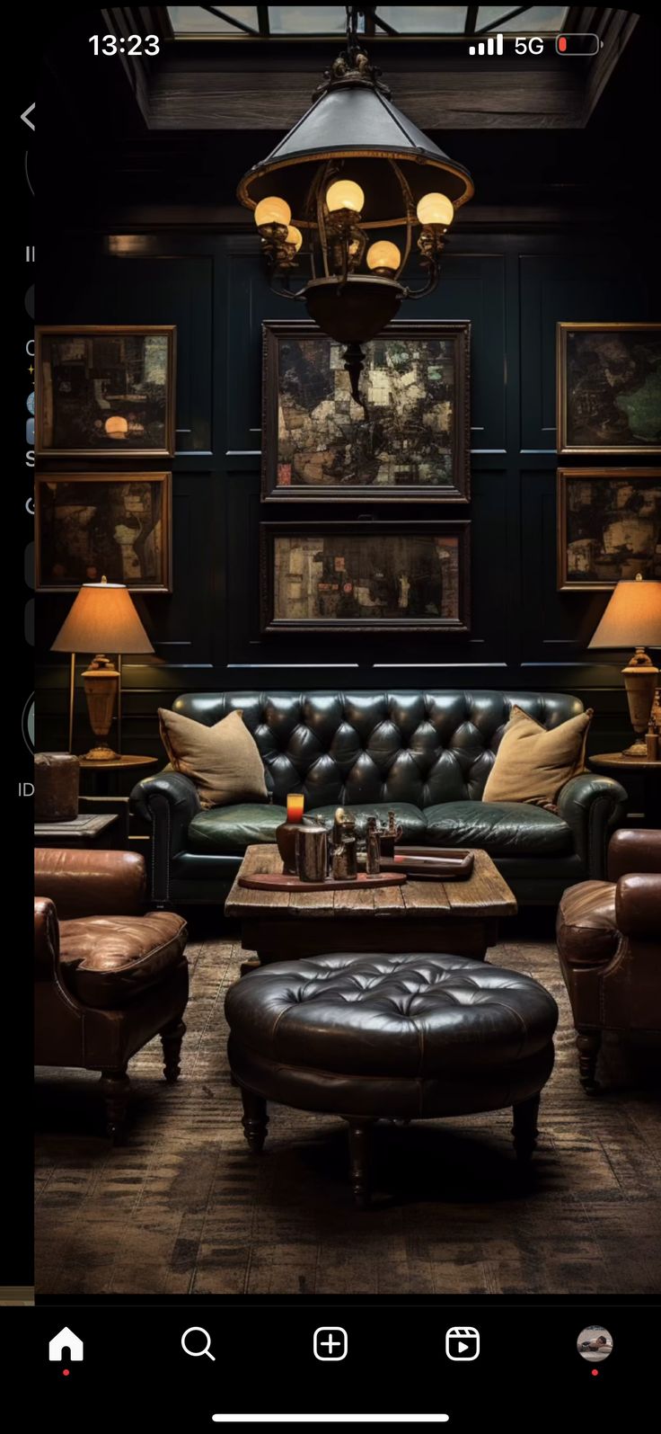 a living room with leather furniture and pictures on the wall above it's coffee table