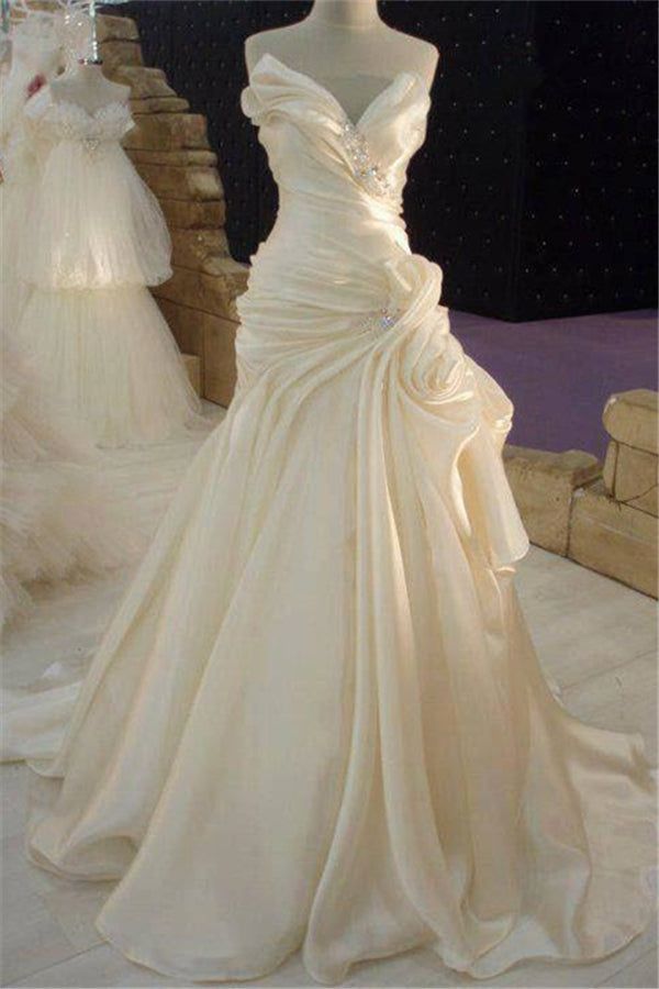 a wedding dress on display in a store