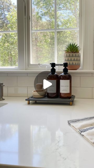 the kitchen counter is clean and ready to be used as a soap dispenser