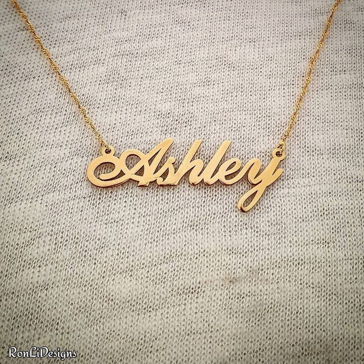 Wear your name with pride with this stunning solid 14K gold necklace! Order any single name in this pretty lovely classic script typeface Maximum 5 letters for the .4 mm thinner gage, 9 letters for .8 mm upgraded thickness Please type the name in the Personalization box provided upon checkout The capital letter will be 11 tall. --------------Shipping---------------- 🌿 I will make and ship your personalized necklace out to you within 4-7 business days. FREE STANDARD USPS shipping takes up to 7-1 Signature Gold Jewelry With Initials, Gold Signature Jewelry With Initials, Classic Formal Name Necklace With Initials, Classic Engraved Nameplate Necklace, Formal Yellow Gold Initials Name Necklace, Classic Nameplate Necklaces, Elegant Custom Name Letter Necklace, Formal Engraved Initial Pendant Name Necklace, Classic Engraved Name Necklace For Mother's Day