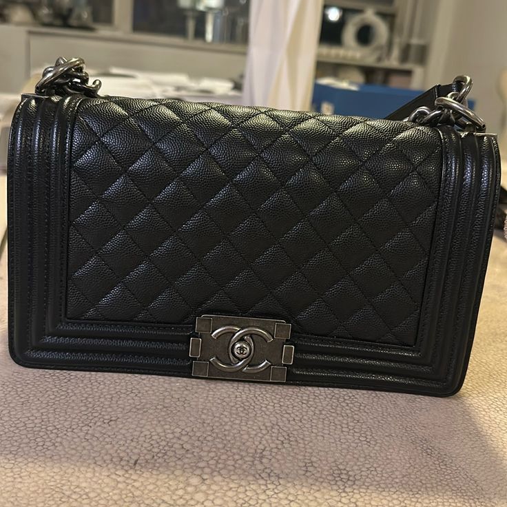 Chanel Boy Leather Crossbody Bag Worn Only A Few Times No Damages Looks Brand New Classy And Elegant Black Bag High-end Black Crossbody Shoulder Bag, High-end Black Shoulder Bag, High-end Black Flap Bag For Travel, High-end Black Rectangular Flap Bag, High-end Black Flap Bag With Dust Bag, Luxury Black Bucket Shoulder Bag, Luxury Black Satchel Shoulder Bag, Black High-end Satchel Flap Bag, High-end Black Satchel Flap Bag