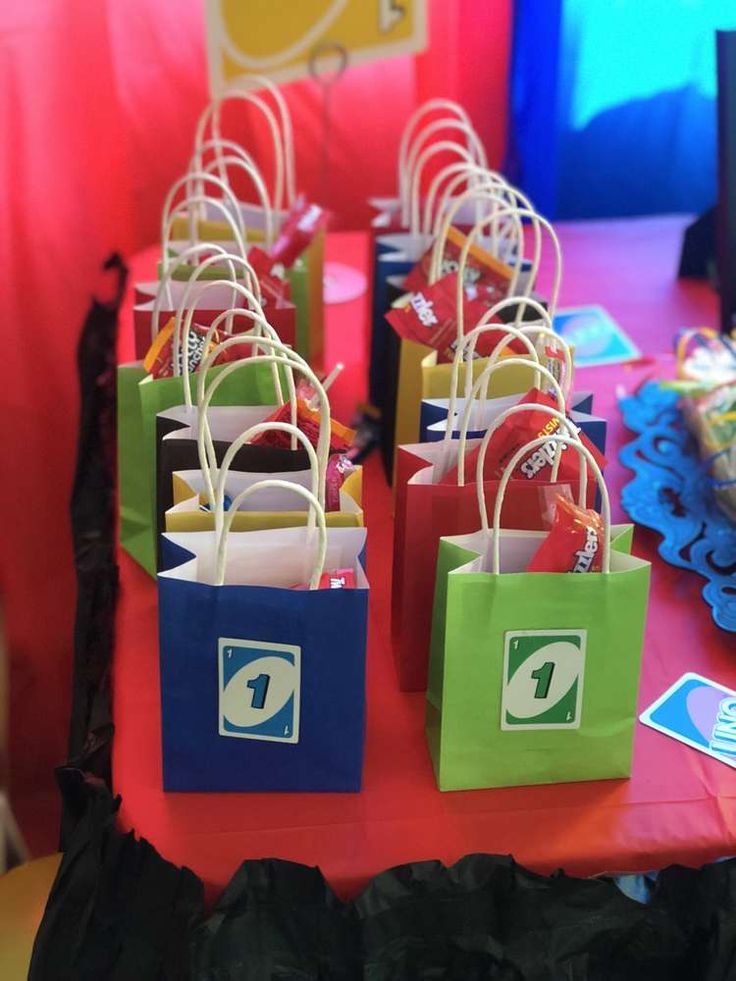 several bags are lined up on a table