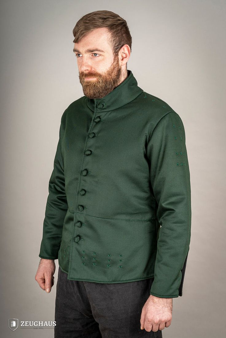 Our 15th-century-style arming doublet is designed to fit into any armor set with ease, providing a secure fit and sturdy anchorage for the legs, arms, and shoulders. Crafted from lightweight yet resilient cotton, it offers superior comfort and protection. • Dyed with natural dyes. For best results, wash by hand with cold water and mild detergent. We also advise turning the garment over to protect the garment’s outer side. • External fabric is made up of 100% cotton • Padding is made of 100% poly Fitted Medieval Outerwear For Fantasy Events, Medieval Outerwear For Larp With Historical Design, Historical Design Outerwear For Medieval Festivals, Elven Outerwear For Medieval Festivals, Medieval Style Outerwear For Larp And Festivals, Medieval Style Outerwear For Larp And Medieval Festivals, Medieval Style Outerwear For Fantasy Events, Black Week, Waist Circumference