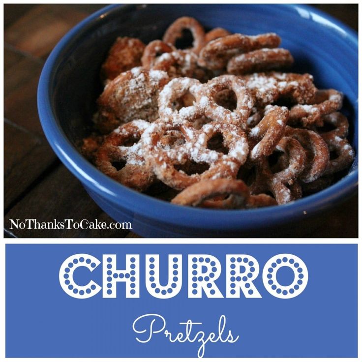 a blue bowl filled with churro pretzels on top of a wooden table